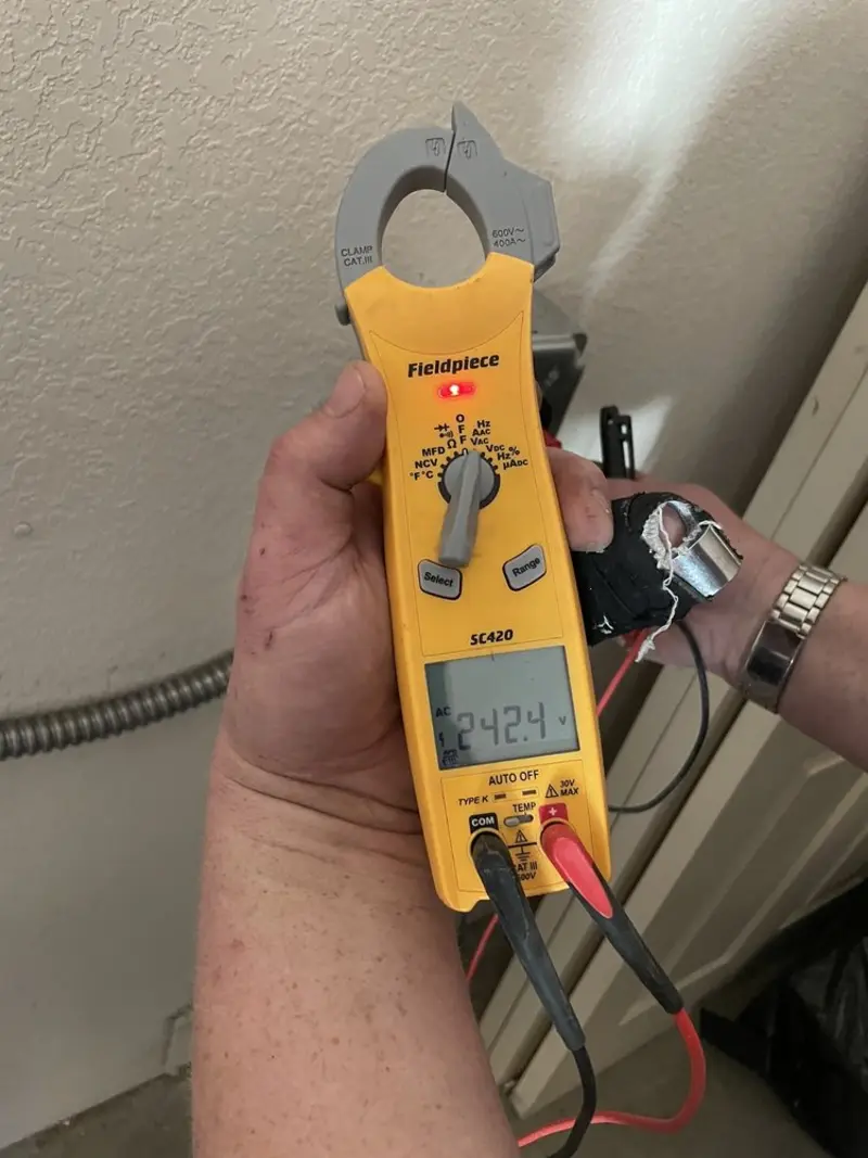 Voltage testing with clamp meter during Aluminum Wiring Replacement in Belleville